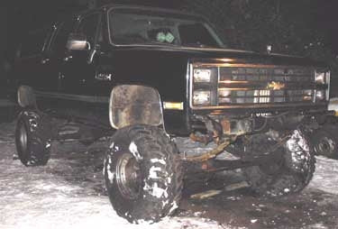 1983 Chevy Suburban with 12" Superlift suspension lift kit