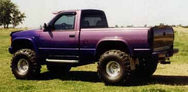 1993 GMC Sierra with 4" Trailmaster suspension lift kit, 3" body lift