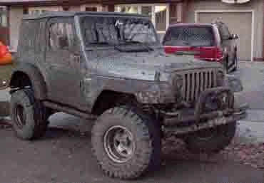 1998 Wrangler with 4" suspension lift kit, 2" body lift