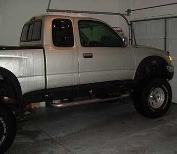 2004 Toyota Tacoma with 6" Trailmaster lift kit, 3" Performance Accessories body lift
