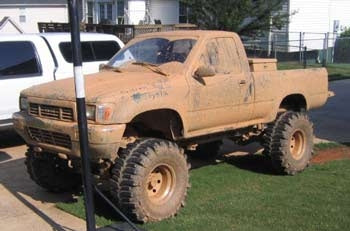 1991 Toyota pickup with 6" Superlift suspension lift kit, 3" body lift