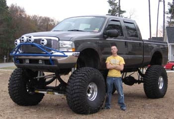 2003 Ford Superduty F-250 V10 with 14" Atlas leaf spring, 3" Performance Accessories body lift