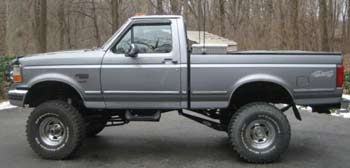 1995 Ford F-150 XLT with 6" Tuff Country suspension lift kit, 2" Performance Accessories body lift