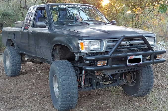 1991 Toyota Pickup with 4.5-5" Rough Country lift kit , 2" body lift