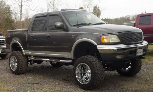 2003 Ford F150 Crew Cab with 8" suspension lift kit, 3" body lift