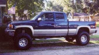 2000 GMC Sierra SLE with Fabtech 6" suspension lift kit, 3" Performance Accessories body lift
