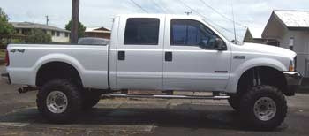 2003 Ford F250 crew cab 6.0 diesel with an 8" Fabtech suspension lift kit