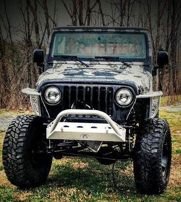 2004 Jeep TJ Wrangler with 6†long arm Rough Country lift kit, 2†body lift