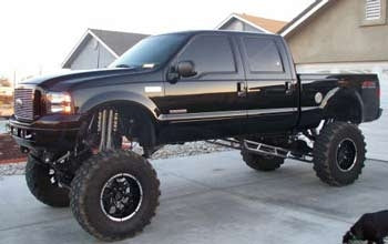 2003 F250 4X4 6.0 PSD with 19" custom suspension lift kit