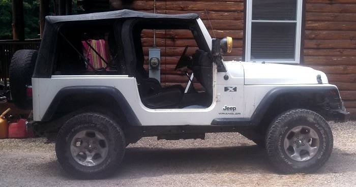2006 Jeep Wrangler with Rough Country 2.5†coil lift kit, 1†Daystar body lift