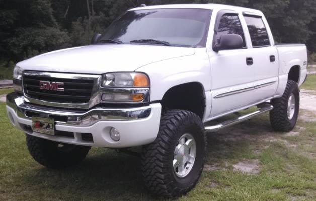 2004 GMC Sierra SLT with 6" Rough Country lift kit