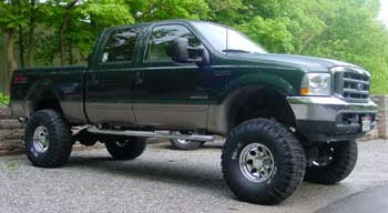 2003 F250 psd Crew Cab Lariat with 8.5" suspension lift kit