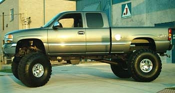 2000 GMC Z71 with 12" lift kit, 3" Performance Accessories body lift