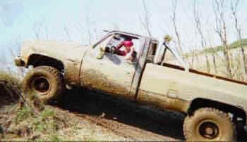 1985 Chevy 1/2T pickup with 8" Skyjacker suspension lift kit, 3" Performance Accessories body lift