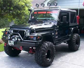 1999 Jeep Wrangler Sahara with 4" Skyacker suspension lift kit, 2" body lift