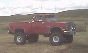 1985 GMC Sierra Classic shortbox 4x4 with 6" Tuff Country suspension lift kit, 3" Performance Accessories body lift