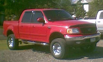 2001 F150 Supercrew 5.4 V-8 with 4" Rancho suspension lift kit, 3" body lift
