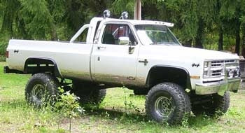 1986 Chevy Silverado with 8" suspension lift kit, 3" body lift