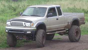 2001 Toyota Tacoma TRD 4x4 with 6" Trailmaster suspension lift kit, 3" Fabtech Coilovers, 3" body lift
