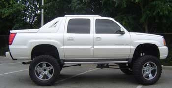 2004 Cadillac Escalade Ext with 8" suspension lift kit, 3" body lift
