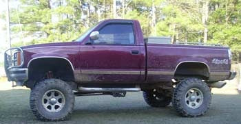 1989 GMC Sierra K1500 with 11" Rough Country lift kit, 3" Performance Accessories body lift