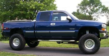 2002 Sierra Z71 with 6" lift kit, 3" Performance Accessories body lift