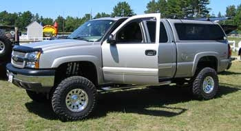 2004 Silverado 2500HD with 9" lift kit, 3" body lift