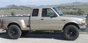 2000 Ford Ranger XLT Step-side with 2" torsion keys, 3" body lift