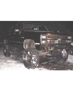 1983 Chevy Suburban with 12" Superlift suspension lift kit