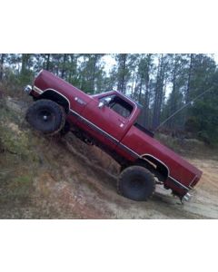 1989 Dodge Power Ram with 6" Skyjacker suspension lift kit and 3" Performance Accessories body lift