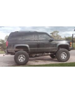 1999 Chevy Tahoe with 6" Rough Country suspension lift kit, 3" body lift, 3" torsion keys