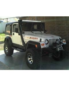 2002 Jeep Sahara with 4" Rough Country suspension lift kit