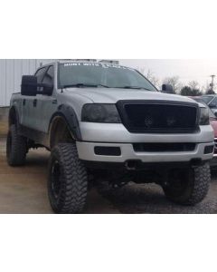 2005 Ford F-150 FX4  with Rough Country 6” suspension lift kit, Zone Offroad 3” body lift